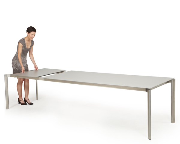 Swing front extension table