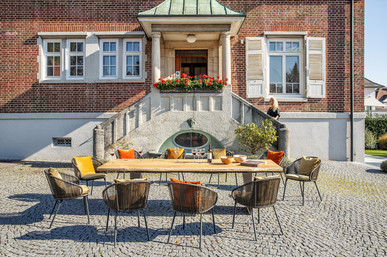 Tierra table and Basil armchair Tierra table and Basil armchair