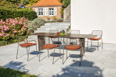 Tierra table and Claris armchair Tierra table and Claris armchair